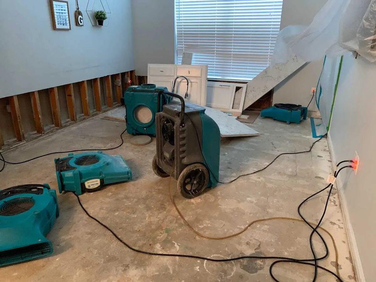 Dehumidifier in flood-cut room for Water Damage Restoration in Damascus